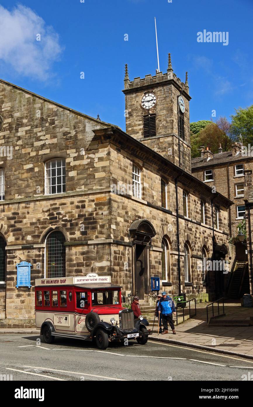 The Holmfirth Tour bus outside Holy Trinity, parish church of Holmfirth