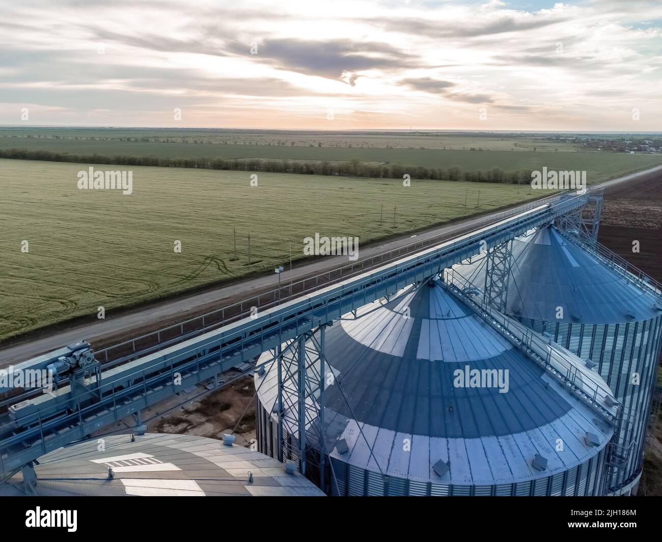 Grain elevator. Metal grain elevator in agricultural zone. Agriculture