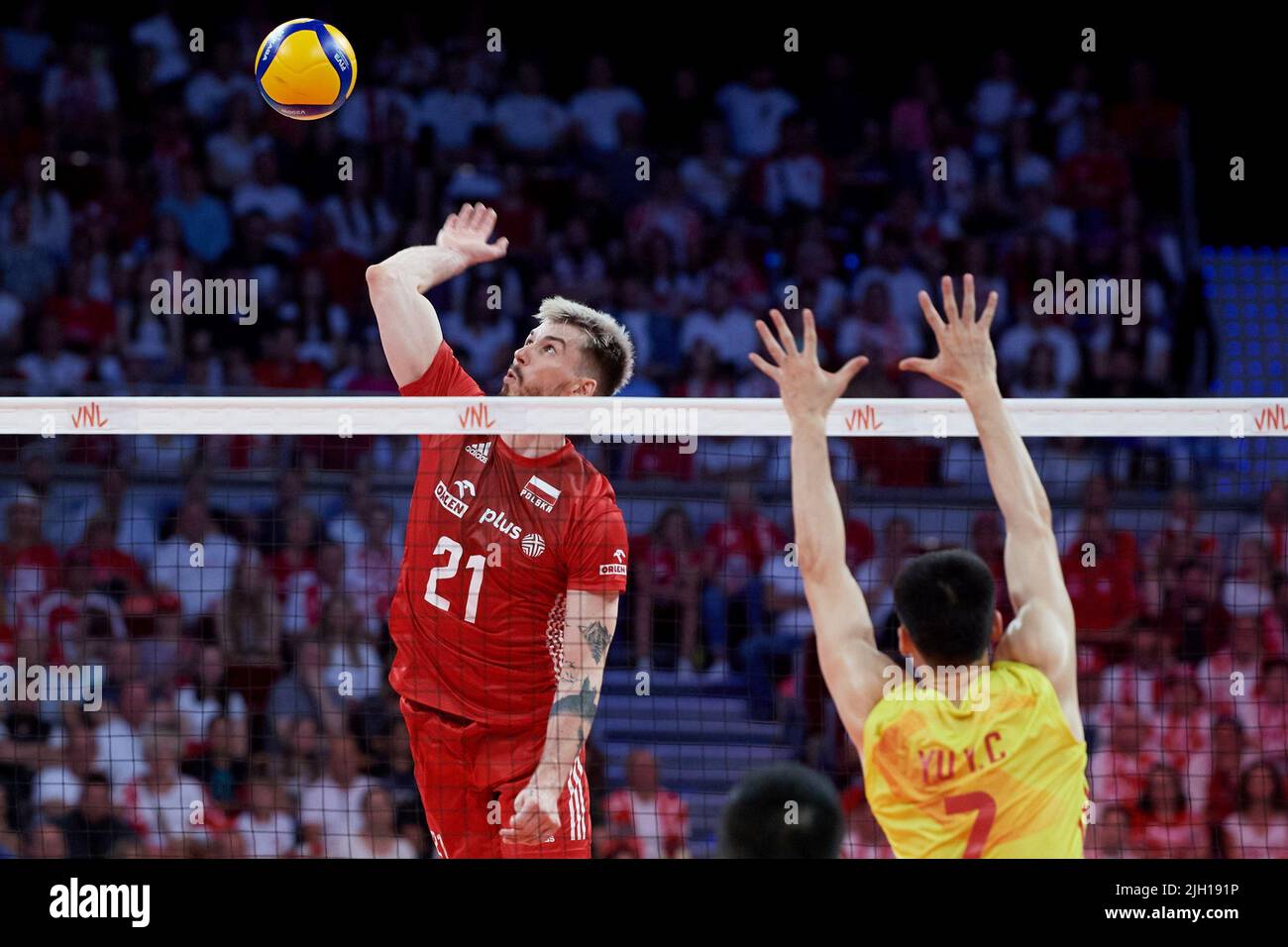 Tomasz Fornal (L) of Poland and Yu Yaochen (R) of China during the 2022 men's FIVB Volleyball Nations League match between Poland and China in Gdansk, Poland, 07 July 2022. Stock Photo