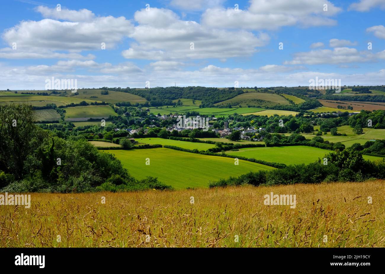 Drone aerial view of Cerne Abbas village and downs countryside, Dorset, England Stock Photo