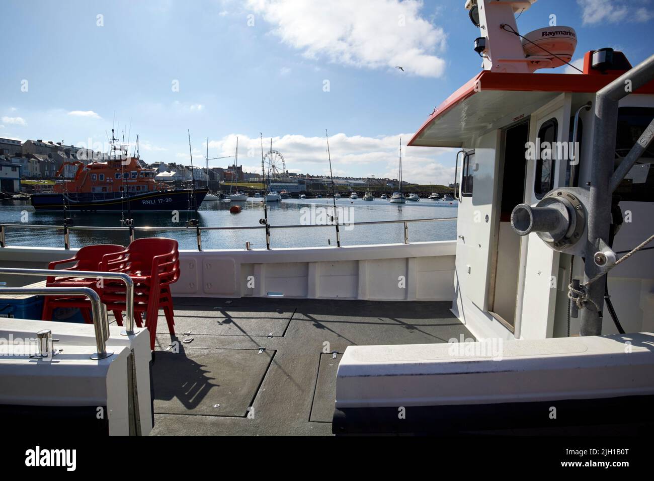 charter angling boat with disabled access at portrush harbour northern ireland uk Stock Photo