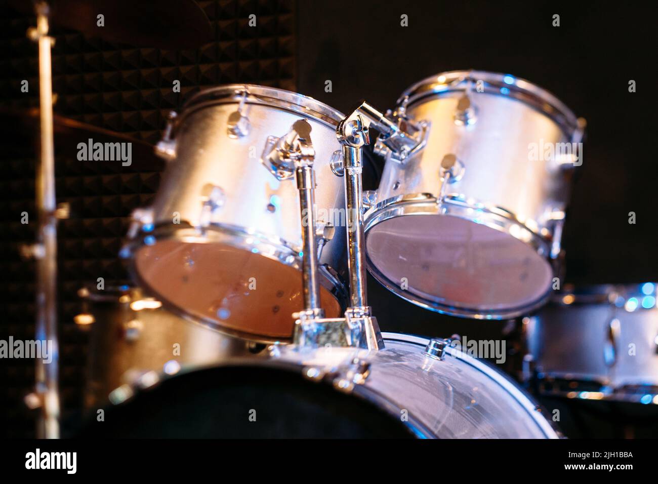 Silver drum set on concert stage Stock Photo Alamy