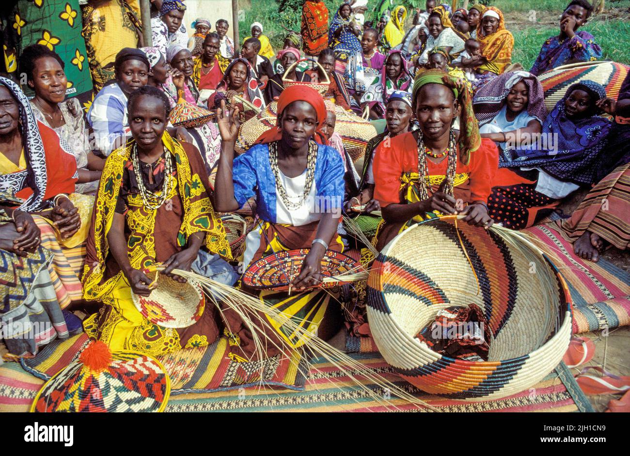 Uganda, Mbarara; Women weaving baskets Stock Photo Alamy