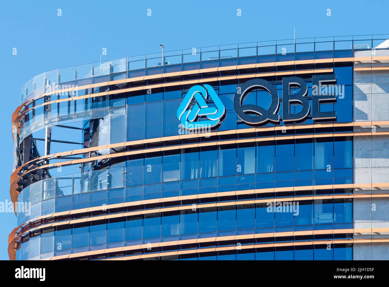 The logo and name of the Insurance giant, QBE on a building in Parramatta, Sydney, New South Wales, Australia Stock Photo