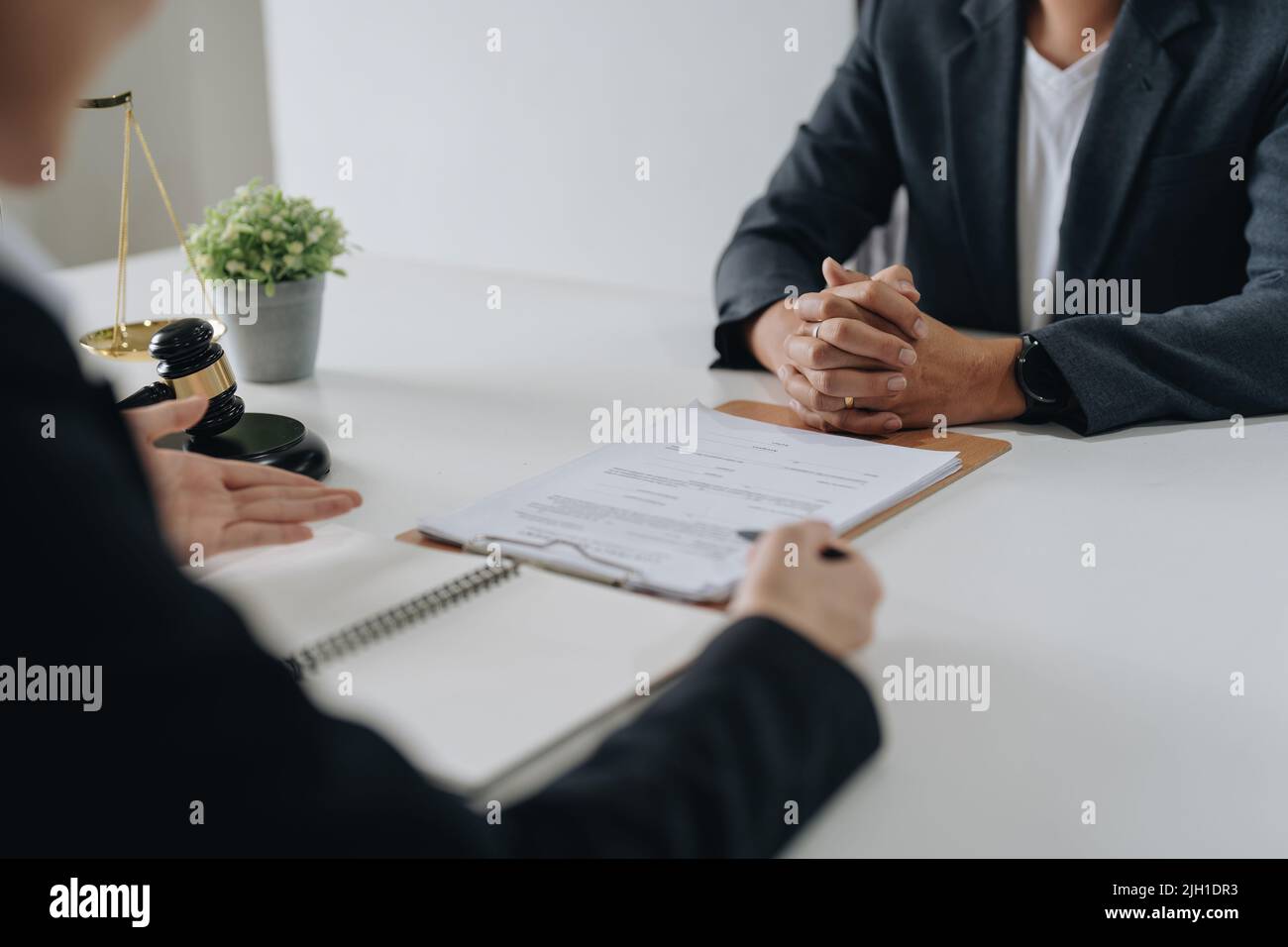 Good service cooperation, Consultation of Businesswoman and Male lawyer or judge counselor having team meeting with client, Law and Legal services Stock Photo