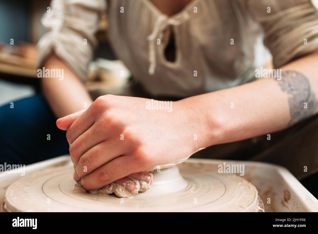 Close Up Of Female Hands Working On Potters Wheel Stock Photo - Download  Image Now - Pottery, Potter, Pottery Wheel - iStock