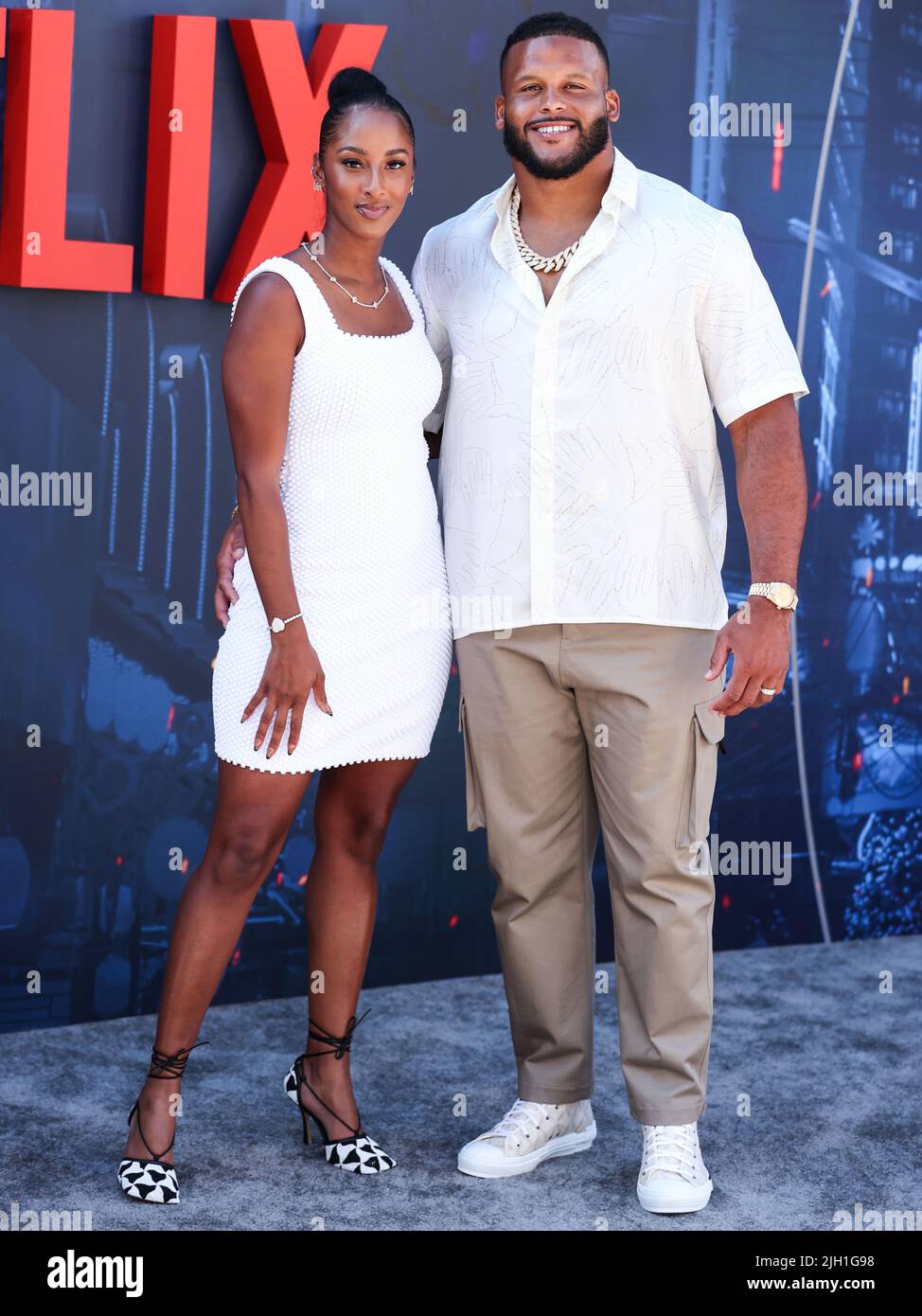 HOLLYWOOD, LOS ANGELES, CALIFORNIA, USA - JULY 13: Erica Donald and husband/American football defensive tackle player Aaron Donald arrive at the World Premiere Of Netflix's 'The Gray Man' held at the TCL Chinese Theatre IMAX on July 13, 2022 in Hollywood, Los Angeles, California, United States. (Photo by Xavier Collin/Image Press Agency) Stock Photo