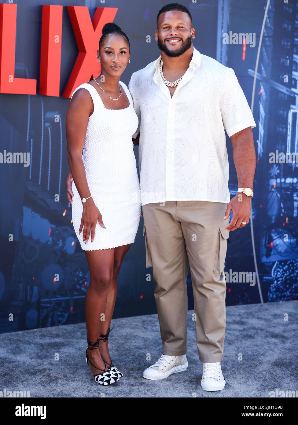 HOLLYWOOD, LOS ANGELES, CALIFORNIA, USA - JULY 13: Erica Donald and husband/American football defensive tackle player Aaron Donald arrive at the World Premiere Of Netflix's 'The Gray Man' held at the TCL Chinese Theatre IMAX on July 13, 2022 in Hollywood, Los Angeles, California, United States. (Photo by Xavier Collin/Image Press Agency) Stock Photo