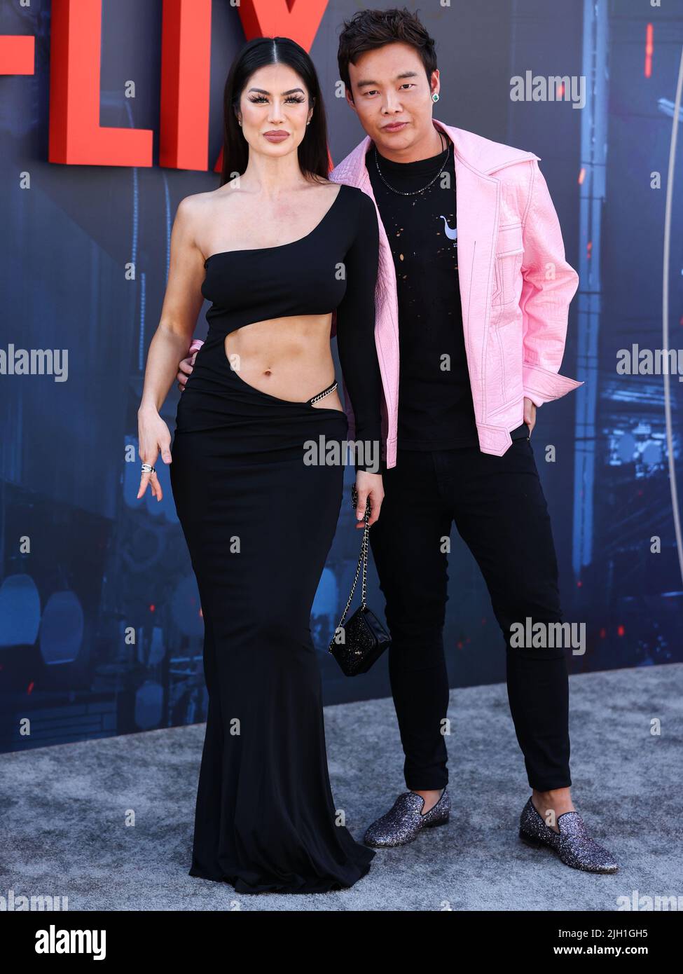 Hollywood, United States. 13th July, 2022. HOLLYWOOD, LOS ANGELES, CALIFORNIA, USA - JULY 13: American actress Kim Lee and Kane Lim arrive at the World Premiere Of Netflix's 'The Gray Man' held at the TCL Chinese Theatre IMAX on July 13, 2022 in Hollywood, Los Angeles, California, United States. (Photo by Xavier Collin/Image Press Agency) Credit: Image Press Agency/Alamy Live News Stock Photo