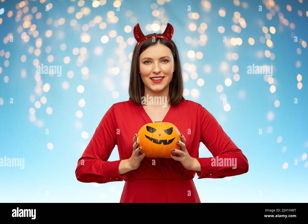Devil in a blue dress hi-res stock photography and images - Alamy