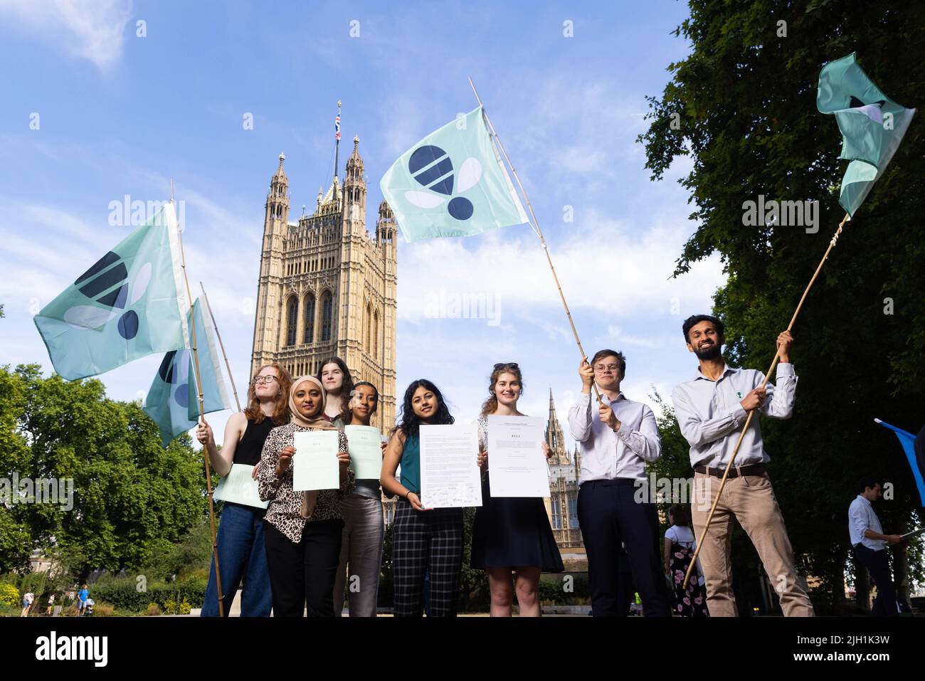 EDITORIAL USE ONLY Members of Zero Hour and various youth groups outside the Houses of Parliament ahead of handing in an open letter to all Members of the House of Lords asking Peers to back the Climate and Ecology Bill ahead of its second reading debate on 15 July 2022. Picture date: Thursday July 14, 2022. Stock Photo