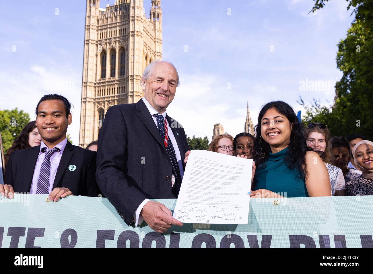 EDITORIAL USE ONLY Lord Redesdale joins members of Zero Hour and various youth groups outside the Houses of Parliament ahead of handing in an open letter to all Members of the House of Lords asking Peers to back the Climate and Ecology Bill ahead of its second reading debate on 15 July 2022. Picture date: Thursday July 14, 2022. Stock Photo