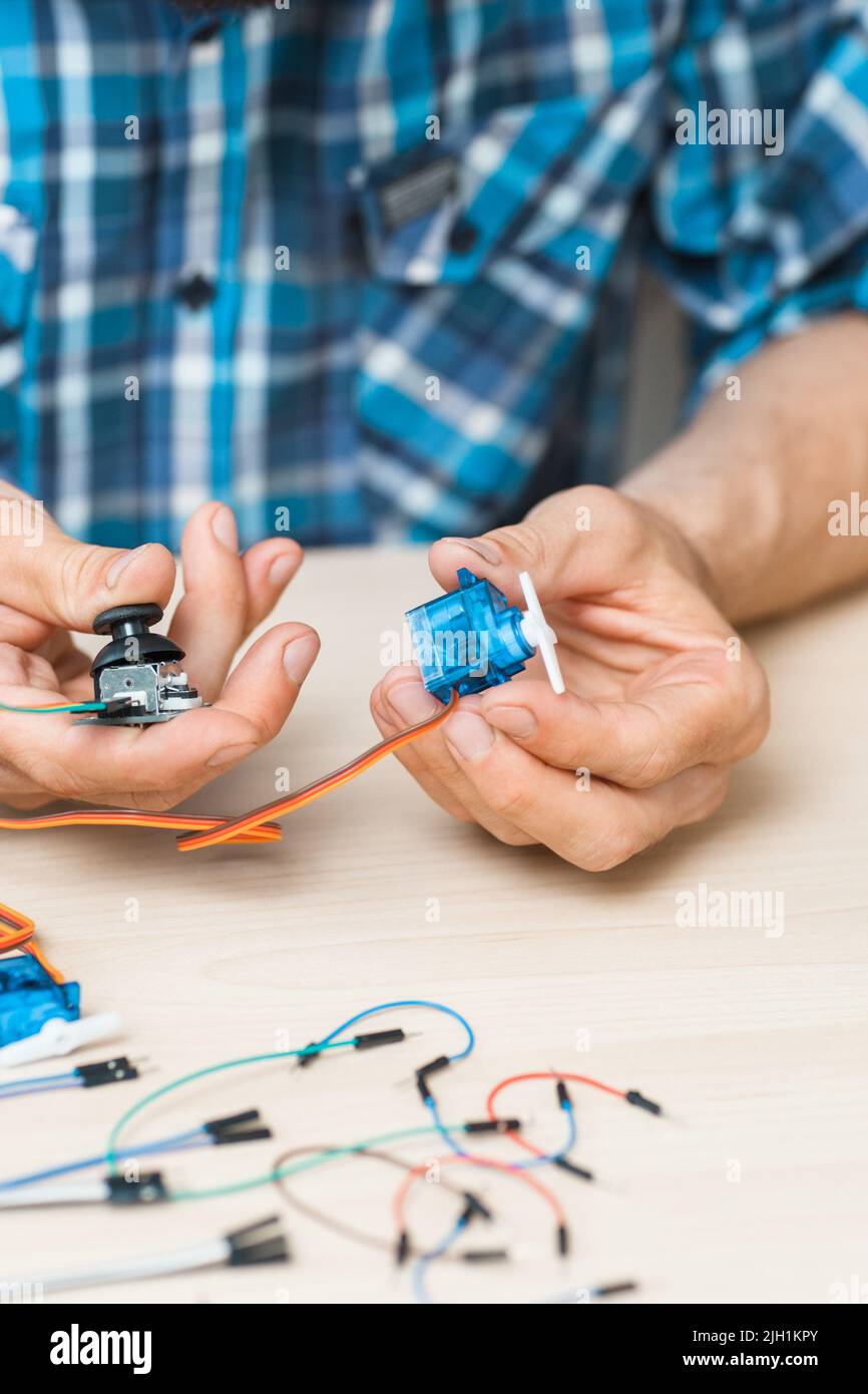 Engineer hands with electronic components Stock Photo Alamy
