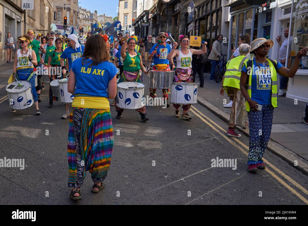 Drumming band performing at the annual carnival as it progresses through the streets of the historic city of Bath in Somerset. Stock Photo