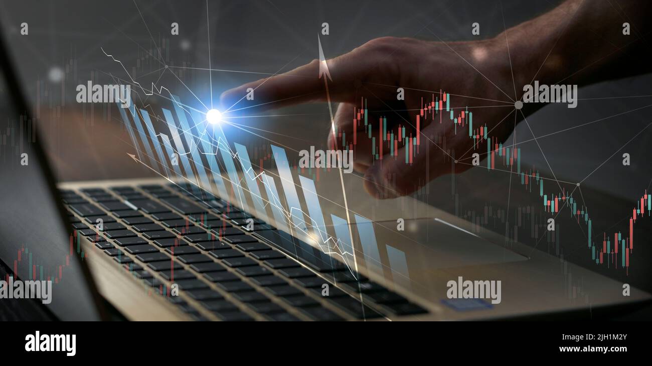 business stock market trading on laptop. finance candles and profile volume. mixed media banner Stock Photo