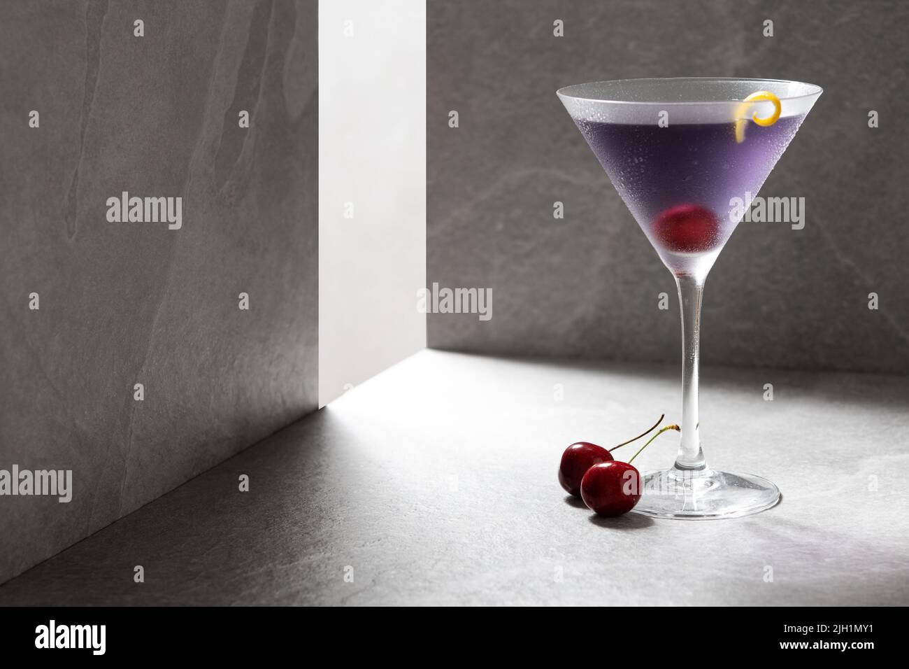 Classic aviation cocktail on gray stone background Stock Photo