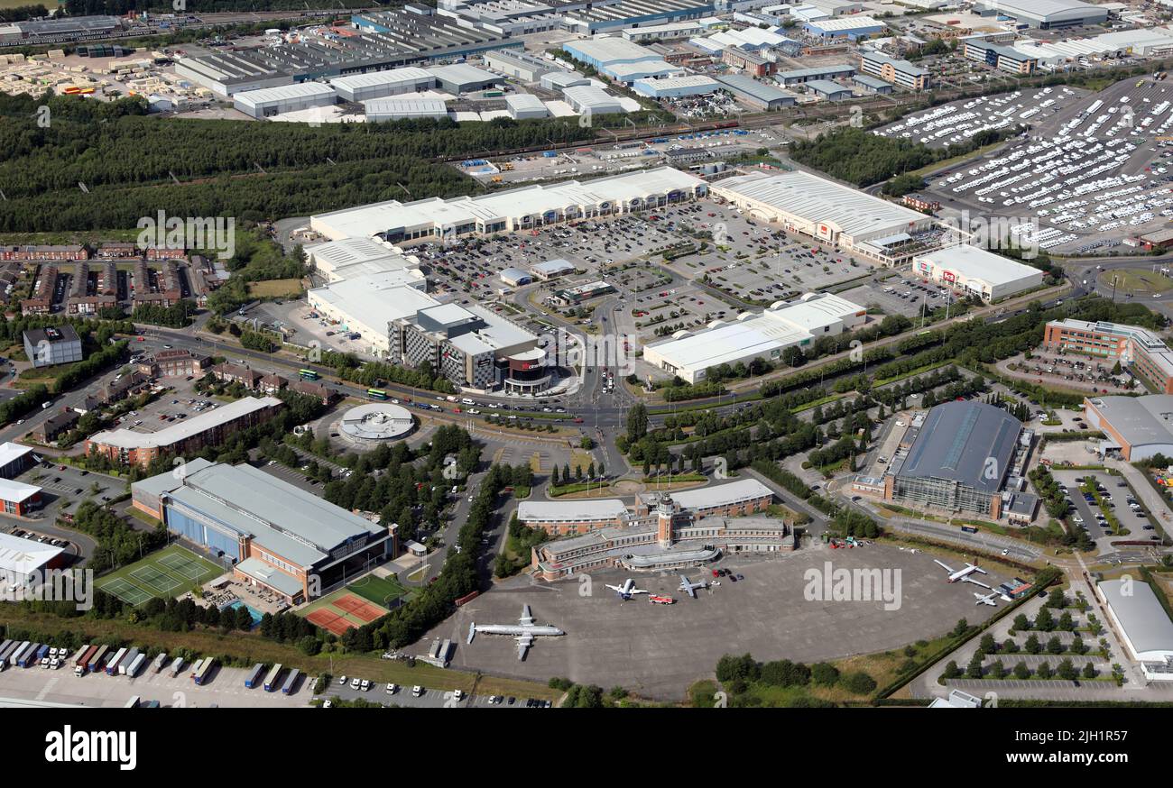 Aerial view of the old Speke Airport & Crowne Plaza Hotel. Behind is the New Mersey Shopping Park (or Speke Retail Park as people call it), Liverpool. Stock Photo