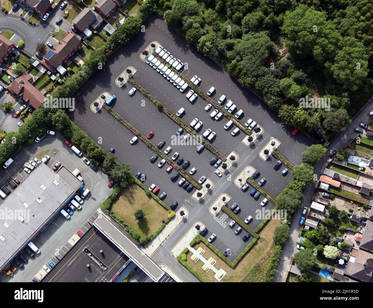 aerial view, almost plumb down vertical, of a car park or parking lot (this one being in Grston, Liverpool, UK) Stock Photo