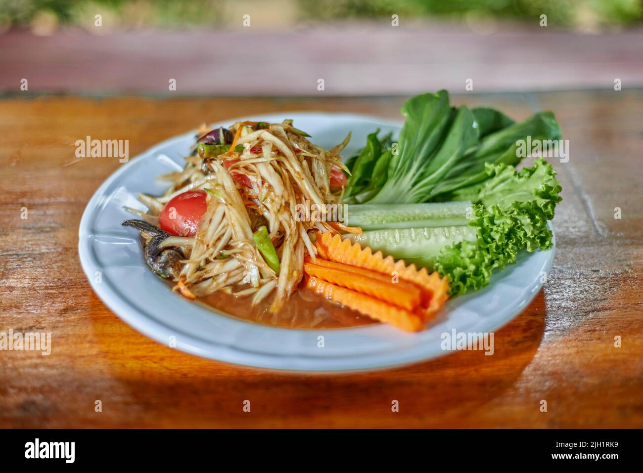 Som tam pu pla ra. Spicy papaya salad.Thai food Stock Photo