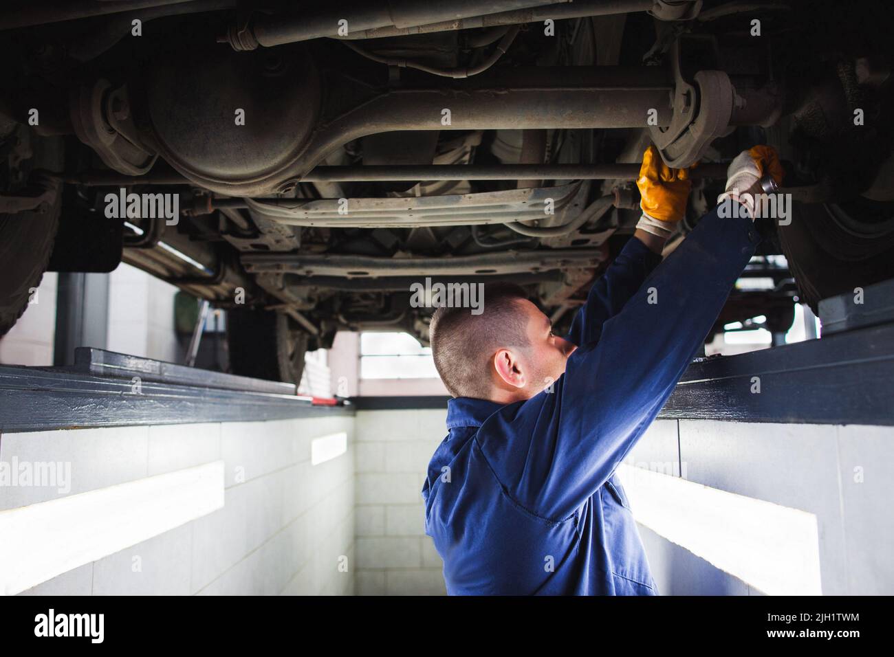 Suspension system of SUV restoration in garage Stock Photo Alamy