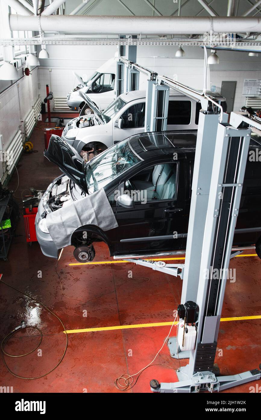 Engine installing conveyor, car production Stock Photo Alamy
