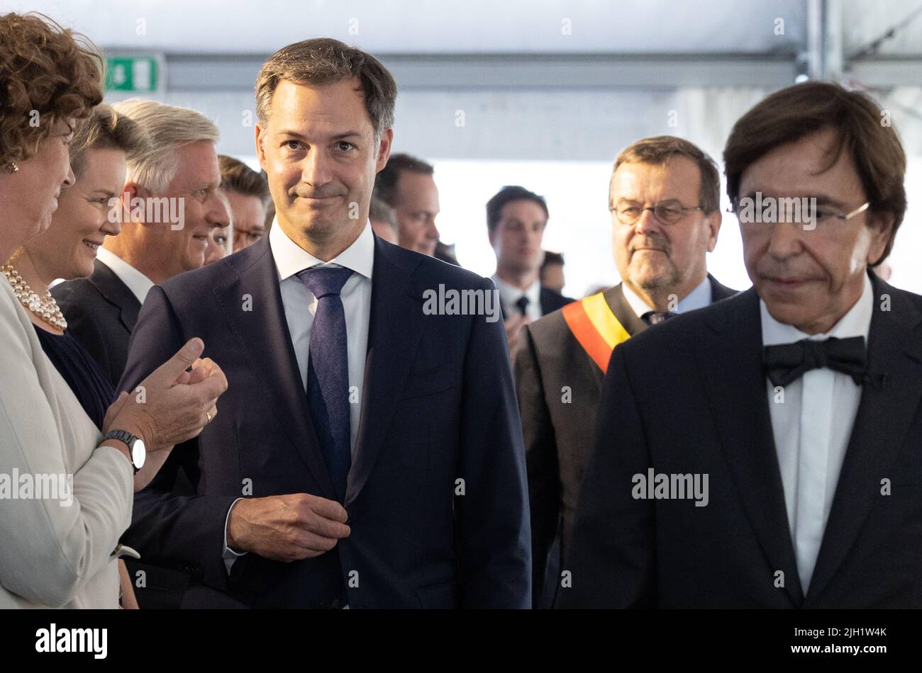 Queen Mathilde of Belgium, King Philippe - Filip of Belgium, Prime Minister Alexander De Croo, Liege mayor Willy Demeyer and Walloon Minister President Elio Di Rupo pictured during a tribute ceremony for those who died during the floods, with the King and Queen of Belgium, one year after the devastating floods that touched the region, Thursday 14 July 2022, in Limburg. July 14 will mark the first anniversary of the terrible floods that hit Wallonia last summer. In July 2021 - on the 14th and 15th - a real torrent poured over several Walloon municipalities, mainly in the provinces of Liege, Nam Stock Photo