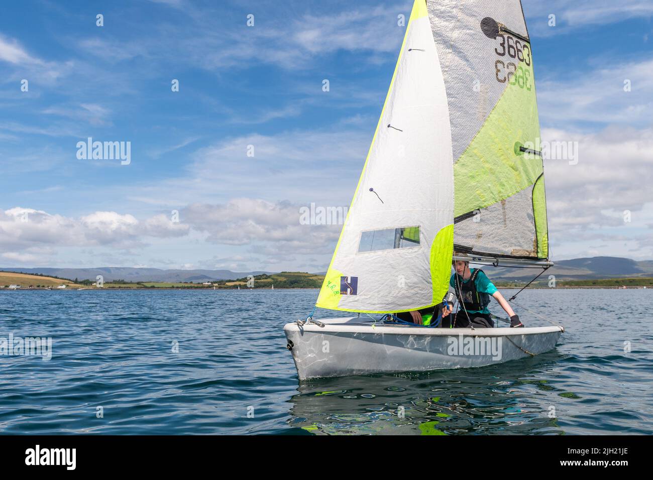 Bantry, West Cork, Ireland. 14th July, 2022. Bantry Bay Sailing Club is holding 'Learn How to Sail' sailing camps for 9 weeks this summer. People from 10 to 80 years old can take to the water and learn how to sail, under experienced instructors. Students were out on the water this morning on a hot and sunny day in West Cork. Credit: AG News/Alamy Live News Stock Photo