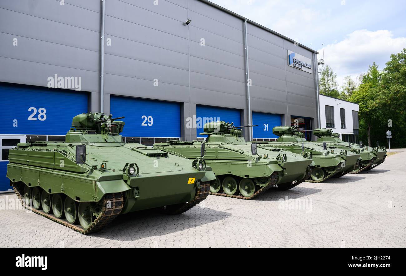 14 July 2022, Lower Saxony, Unterlüß: Reconditioned Marder infantry fighting vehicles stand during a tour of Rheinmetall's Unterluess plant on the occasion of the summer trip of Lower Saxony's Economics Minister. Ukraine wants Germany to provide it with heavier weapons to better equip it in its defensive fight against Russia. Rheinmetall had offered to supply the Marder, which had been decommissioned by the Bundeswehr and was to be reconditioned. However, according to the latest public information, the German government has not yet made a decision. Photo: Julian Stratenschulte/dpa Stock Photo