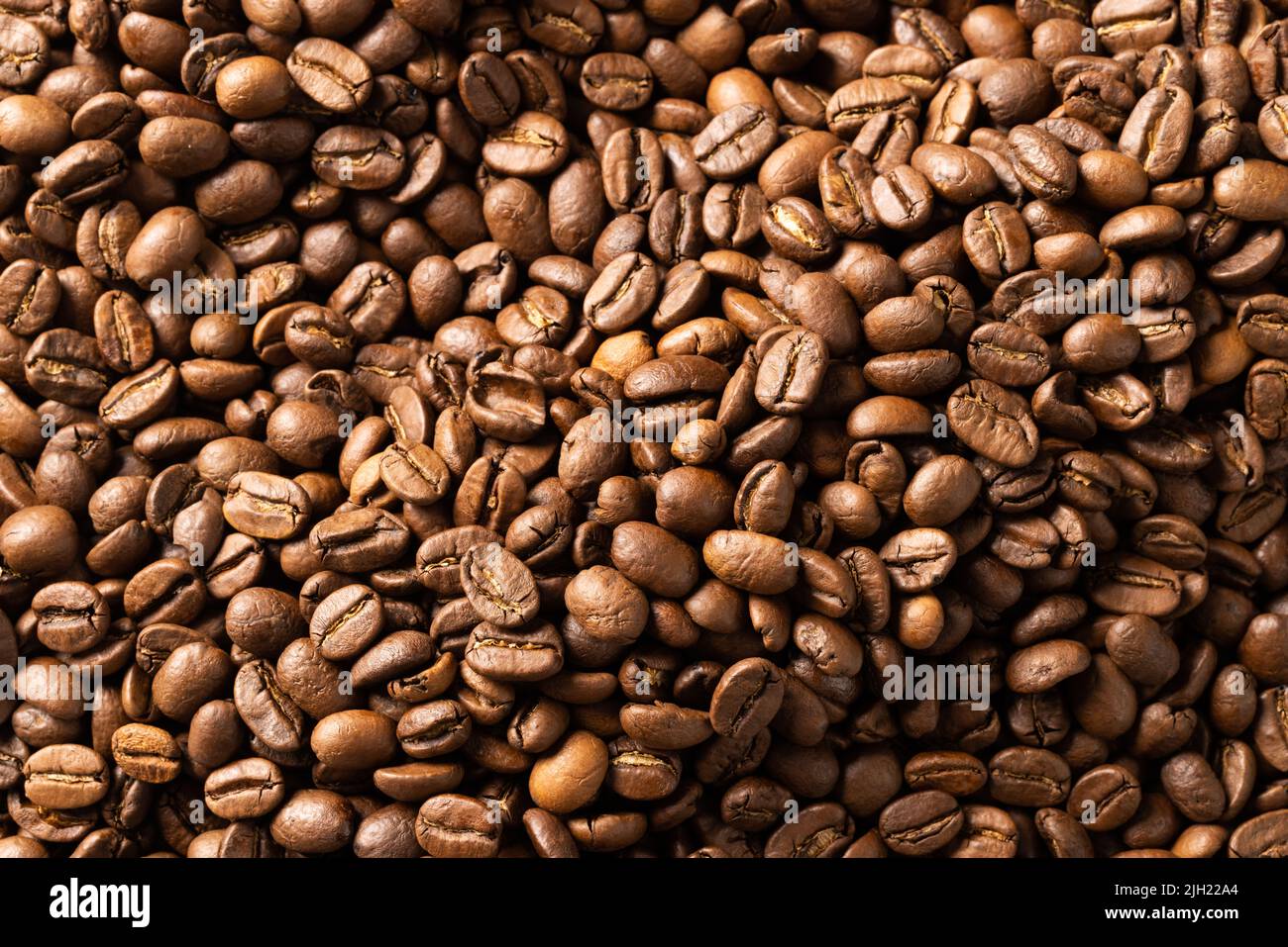 Image of close up of pile of roasting brown coffee beans Stock Photo ...