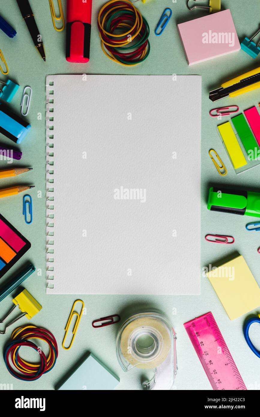 Vertical composition of notebook with copy space and frame made of ...