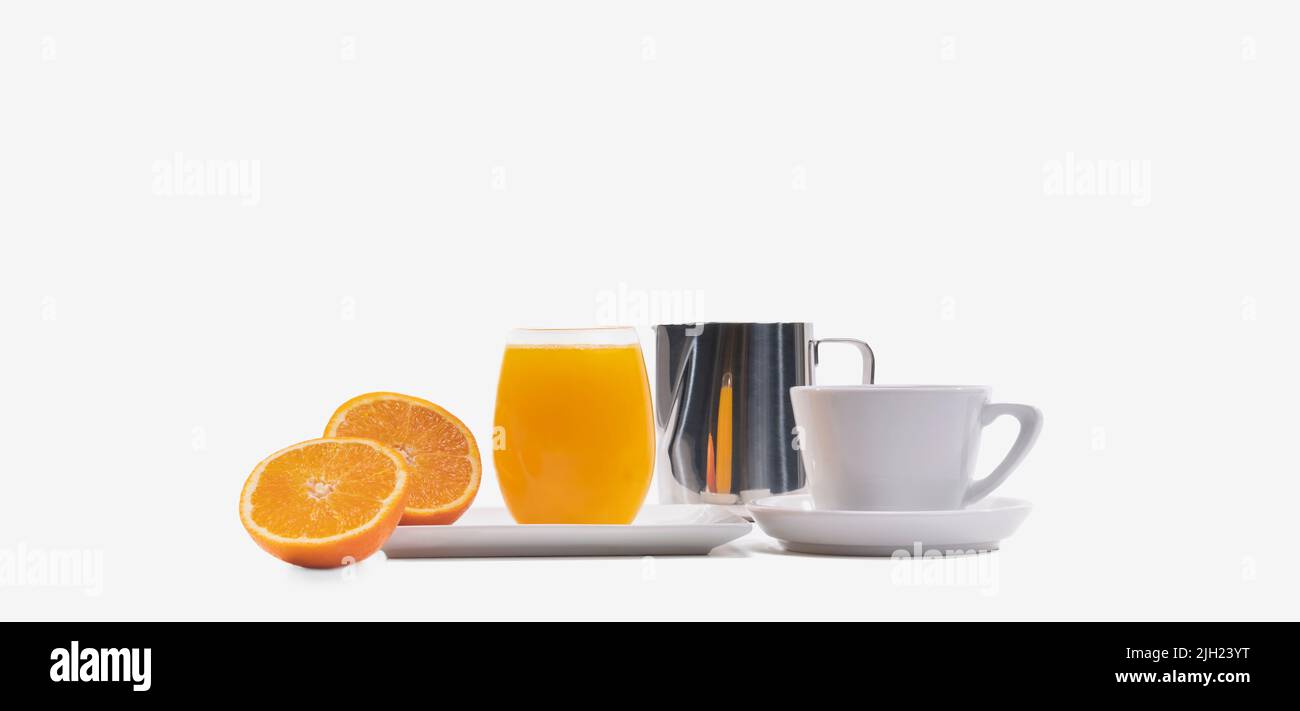Glass of orange juice with oranges and cup of coffee Stock Photo