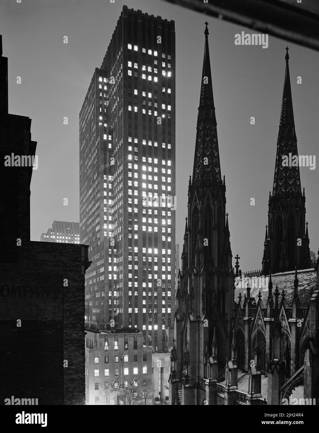 Cityscape at Night, view of Saint Patrick's Cathedral looking West, New York City, New York, USA, Gottscho-Schleisner Collection, 1940 Stock Photo
