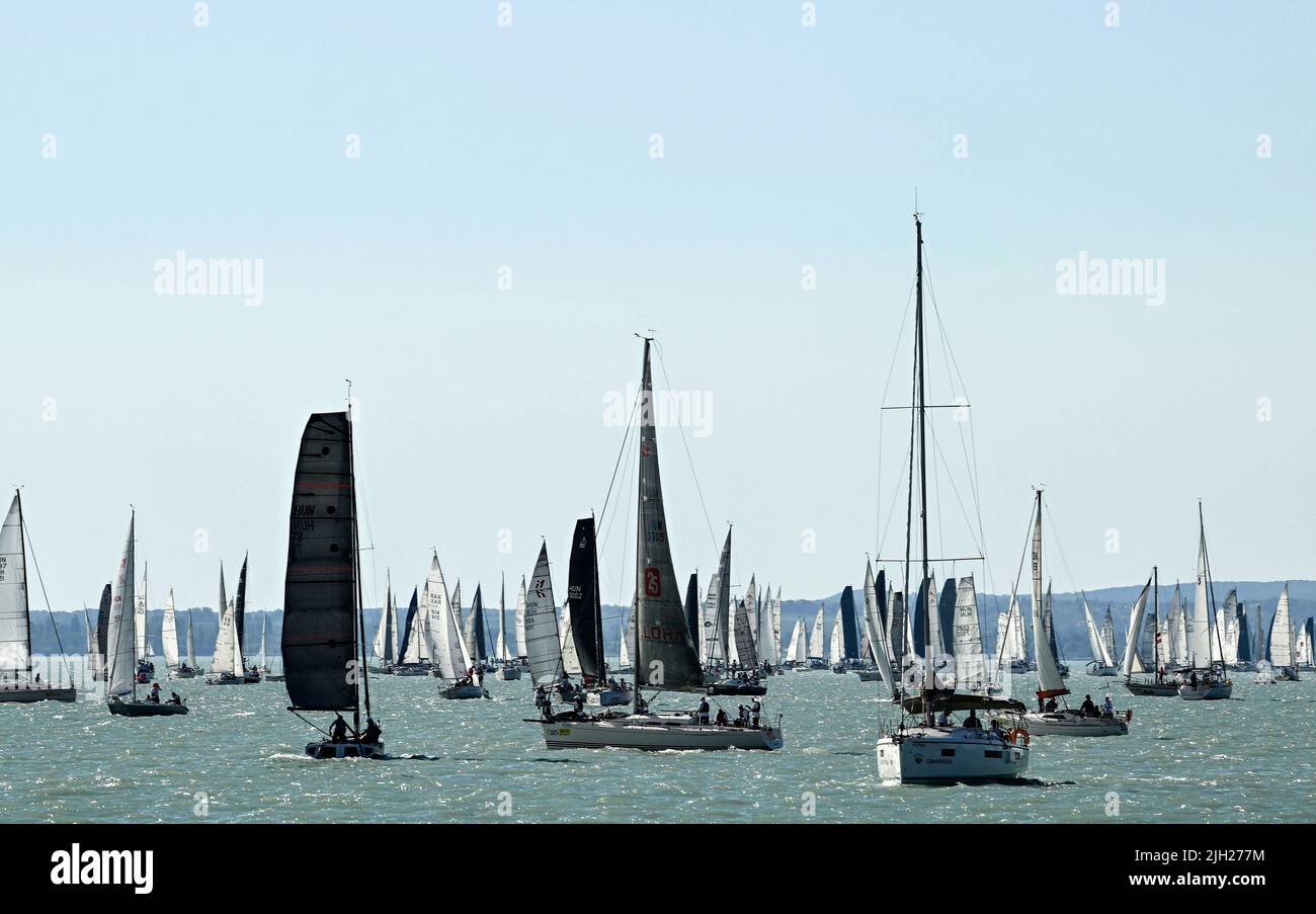 Balatonfured, Hungary. 14th July, 2022. A general view of sailing boats  taking part in the 54th Blue Ribbon Regatta sailing boat race, also known  as the Kékszalag. In this year's event, 516