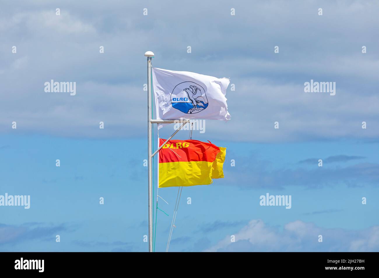 DLRG Flags, Steinwarder Peninsula, Heiligenhafen, Schleswig-Holstein, Germany Stock Photo