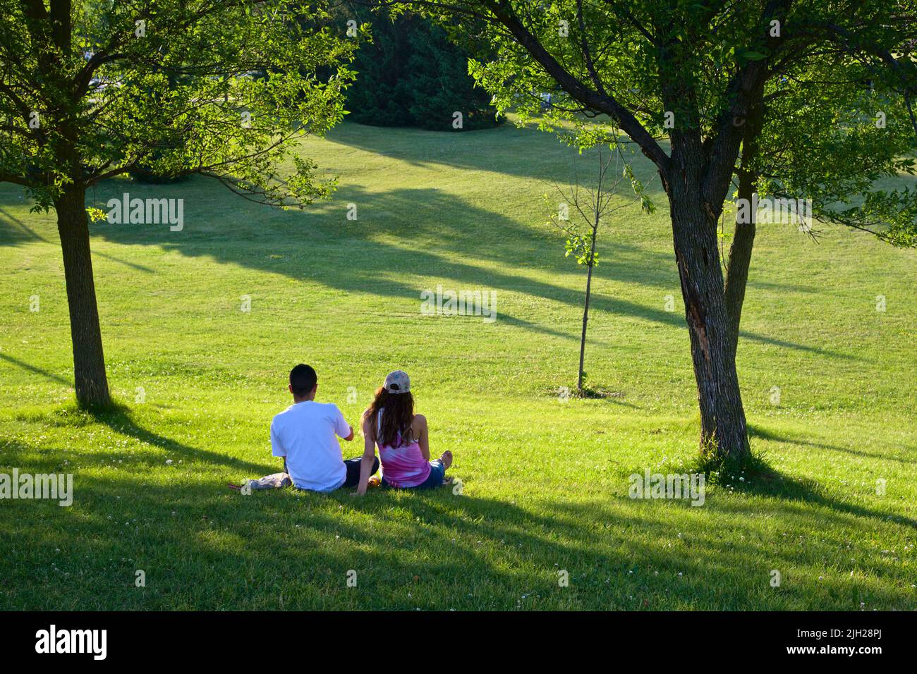 A healthy lifestyle - resting and enjoying in the public park Stock Photo