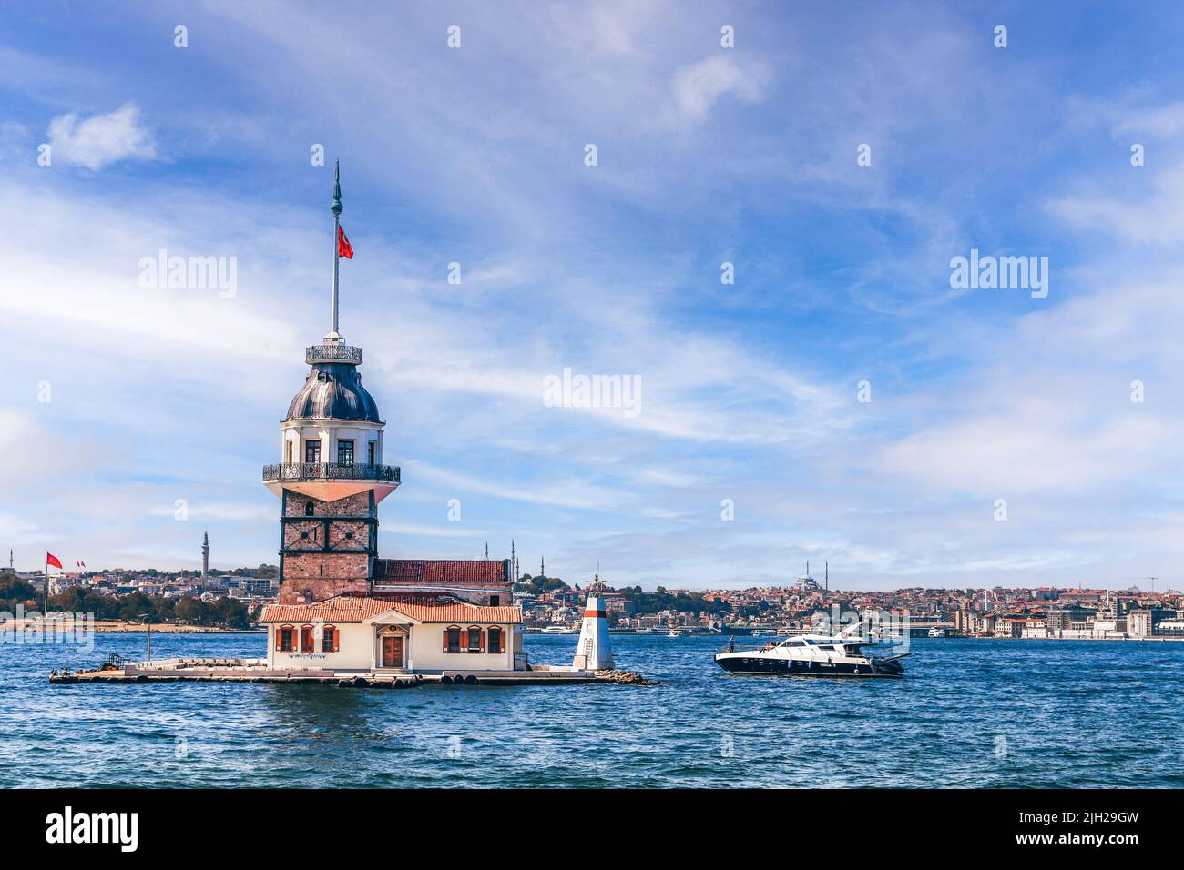 Bosphorus with famous Maiden's Tower (Kiz Kulesi) also known as Leander's Tower, symbol of Istanbul, Turkey. Scenic travel background for wallpaper. Stock Photo