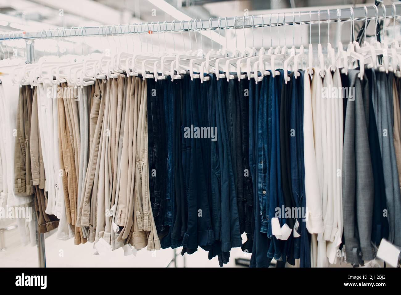 Dry cleaning trousers pants clothes. Clean cloth chemical process