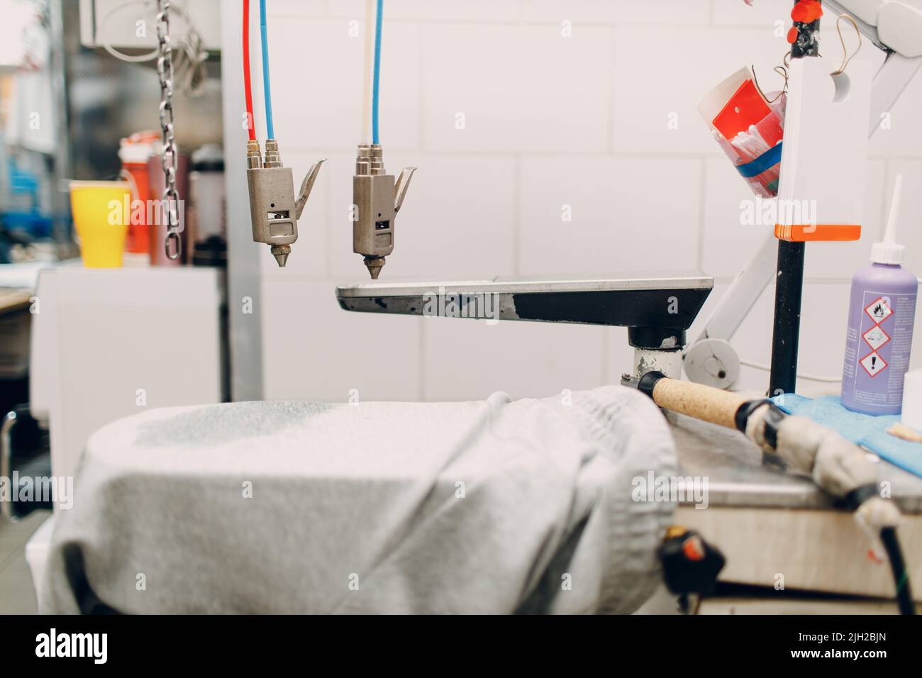 Dry cleaning clothes stain remover equipment. Clean cloth chemical