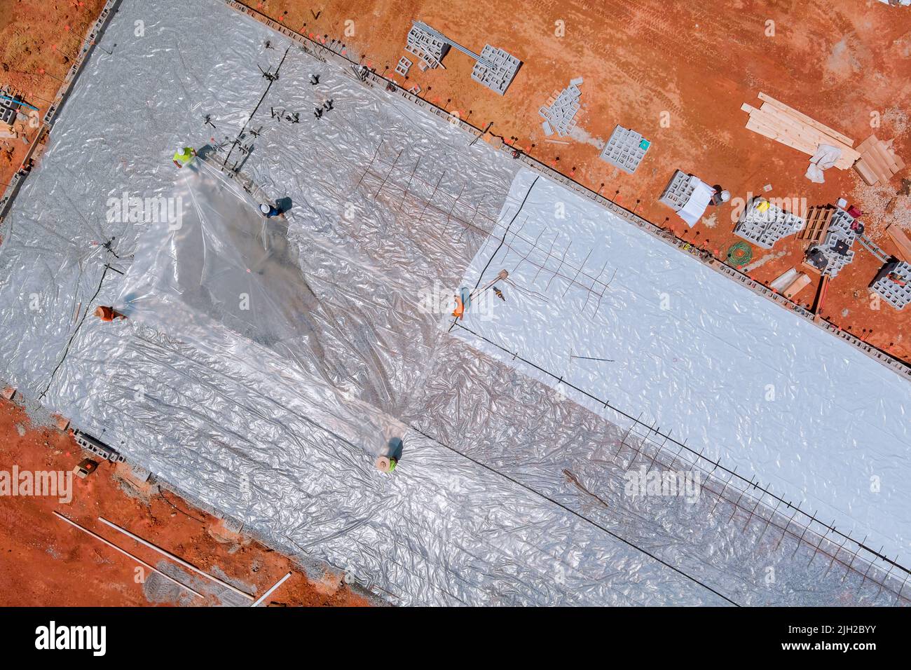 It is necessary to install barrier plastic before pouring concrete to