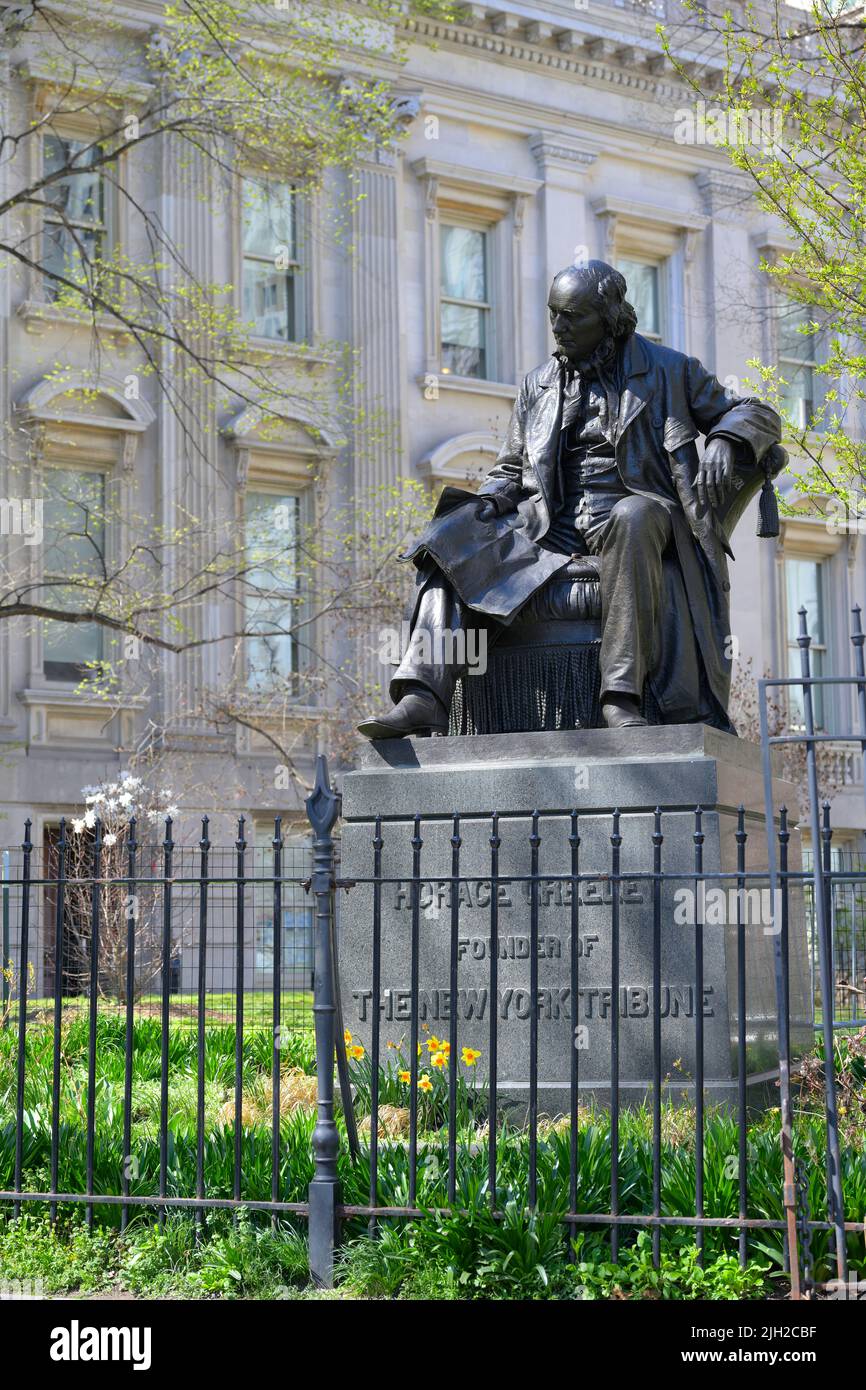 The sculpture of Horace Greeley in front of the Tweed Courthouse, New York City NY Stock Photo