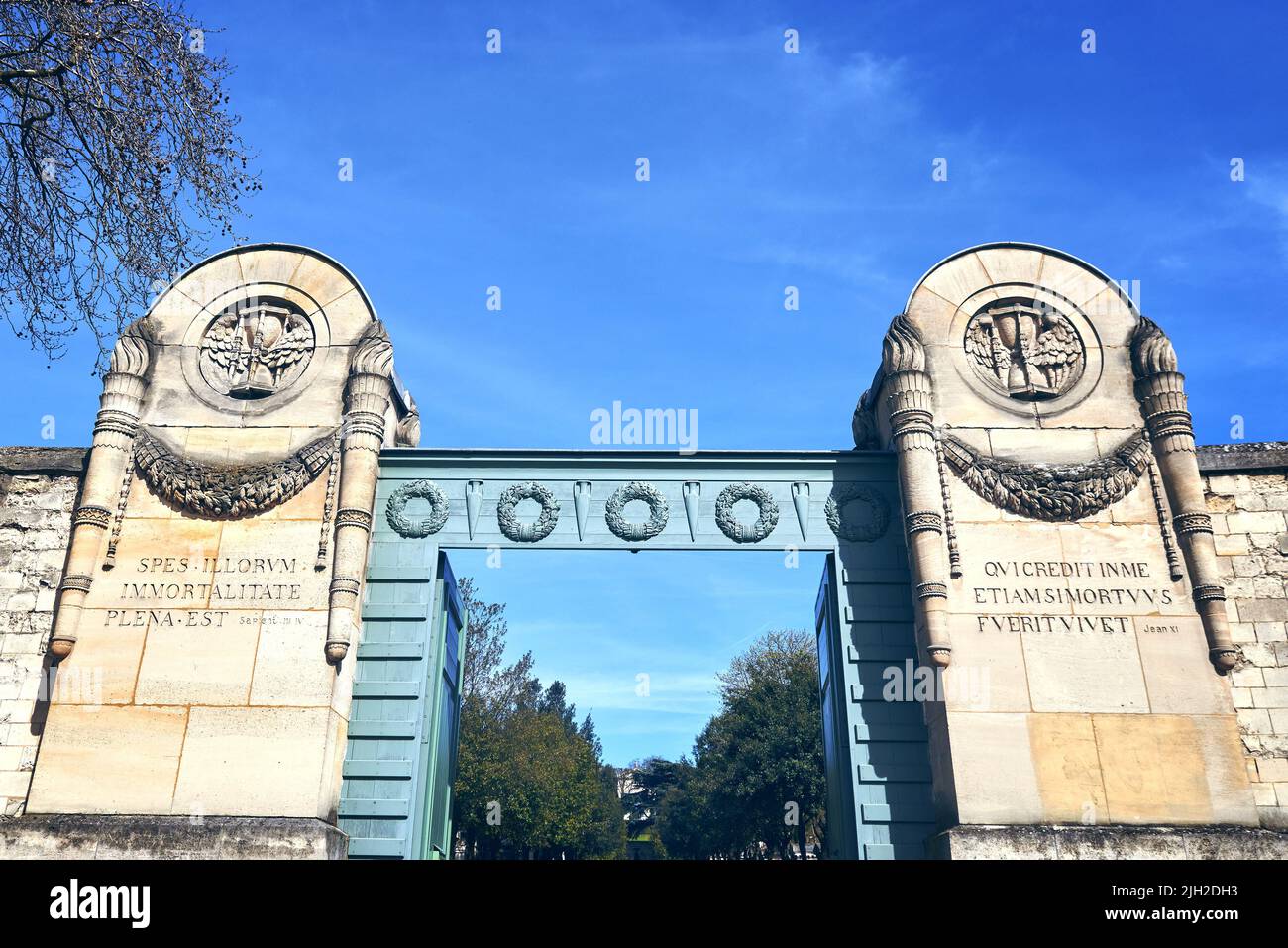 gates to  Pere Lachaise Cemetery in Paris Stock Photo