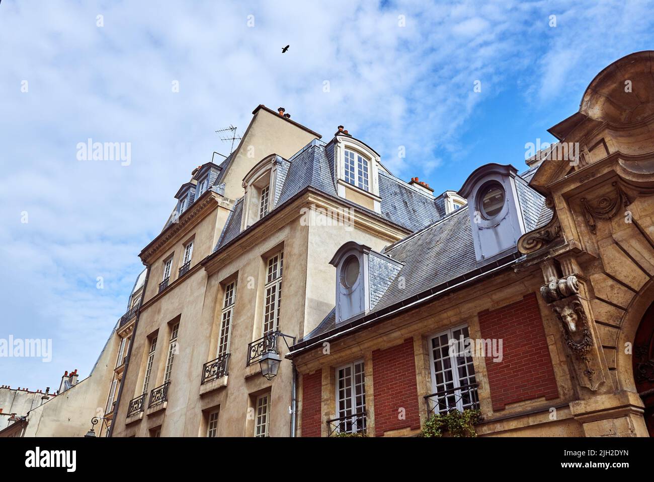 Roofs of old historical buildings in Paris Stock Photo