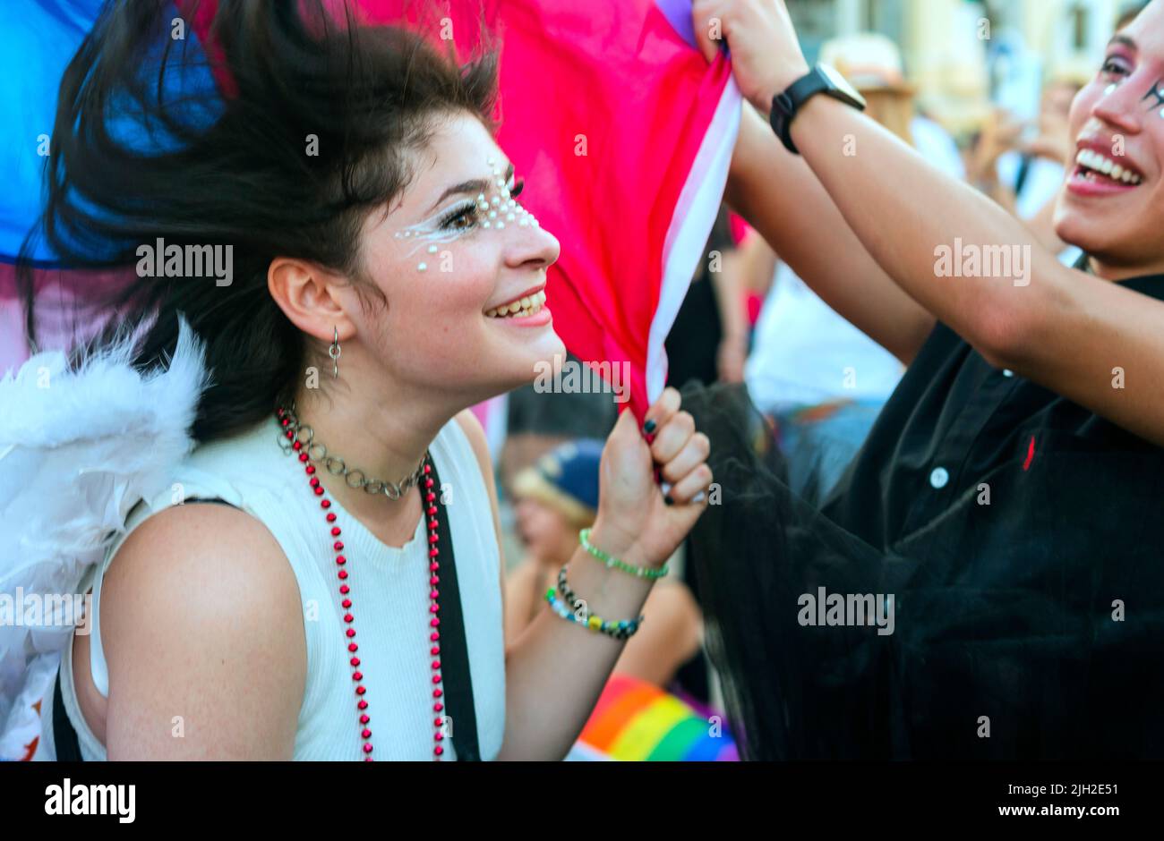 A trans couple enjoying the Gay Pride parade 2022 Madrid Stock Photo