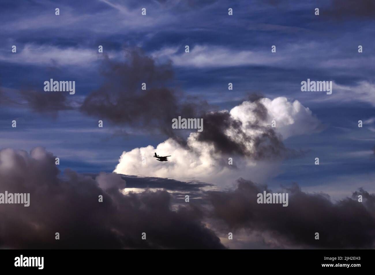 Hydroplane in sky, Cloudy scape Stock Photo