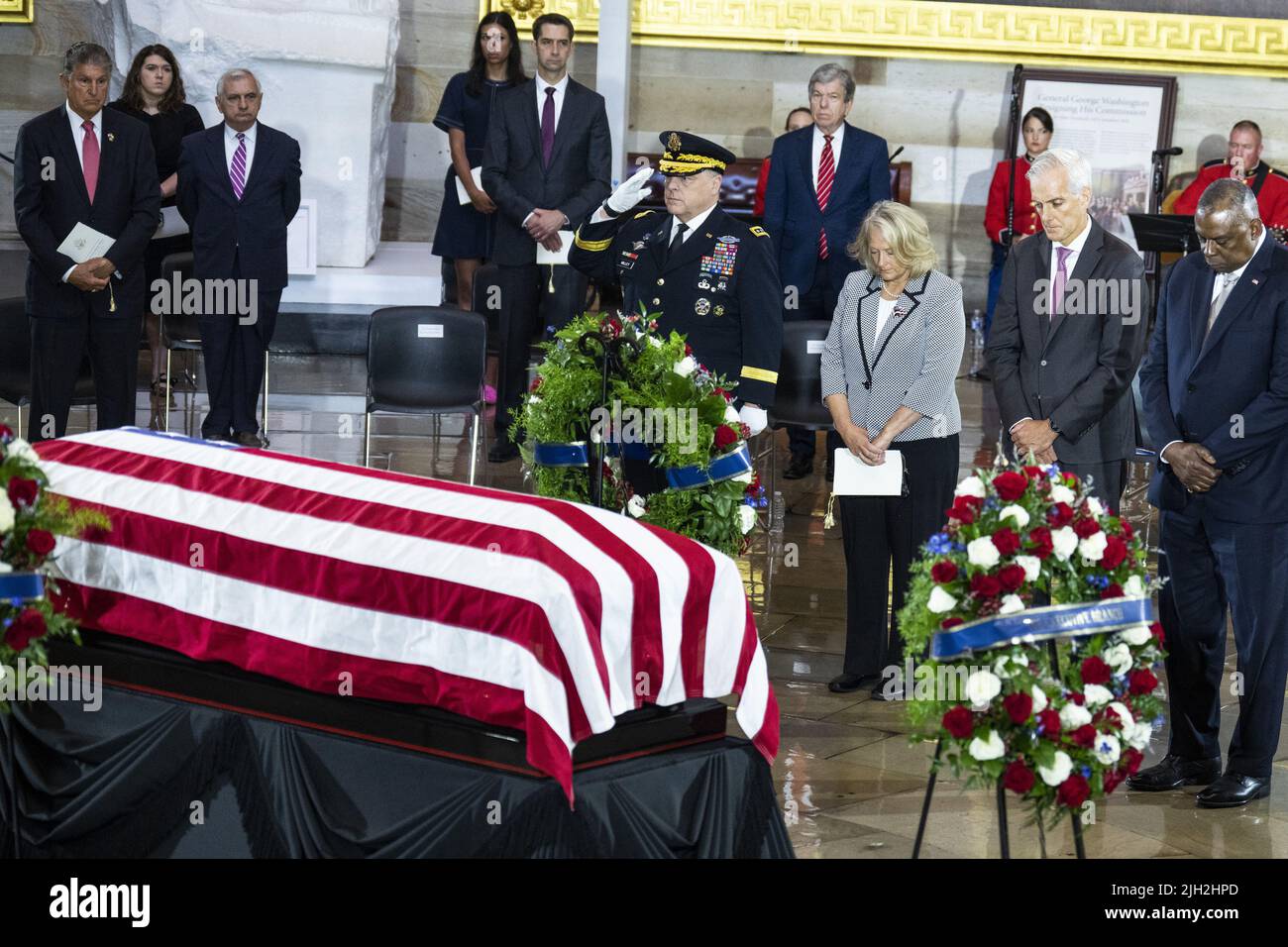 Washington DC, USA. 14th July, 2022. Chairman of the Joint Chiefs of Staff Mark Milley (L), his wife Hollyanne, Veterans Affairs Secretary Denis McDonough (C) and Defense Secretary Lloyd Austin (R) pay respects to Hershel Woodrow 'Woody' Williams, the last Medal of Honor recipient of World War II to pass away, in the U.S. Capitol Rotunda in Washington, DC as his remains lie in honor on Thursday, July 14, 2022. Williams, who passed away at age 98, received the award for action in the Battle of Iwo Jima. Pool Photo by Tom Williams/UPI Credit: UPI/Alamy Live News Stock Photo