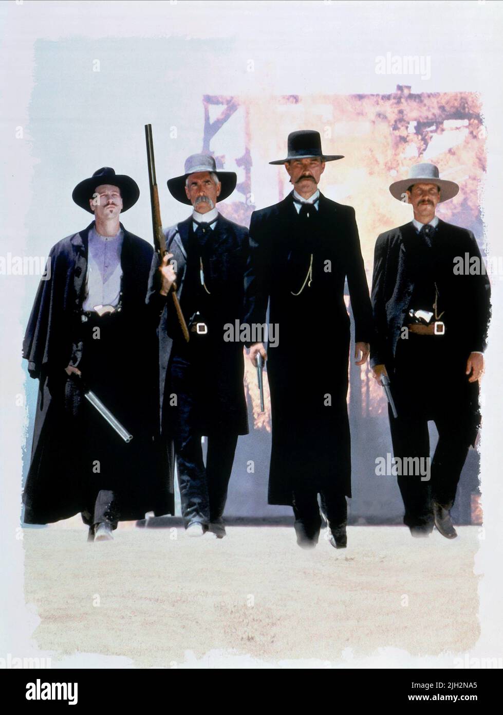 KILMER,ELLIOTT,RUSSELL,PAXTON, TOMBSTONE, 1993 Stock Photo