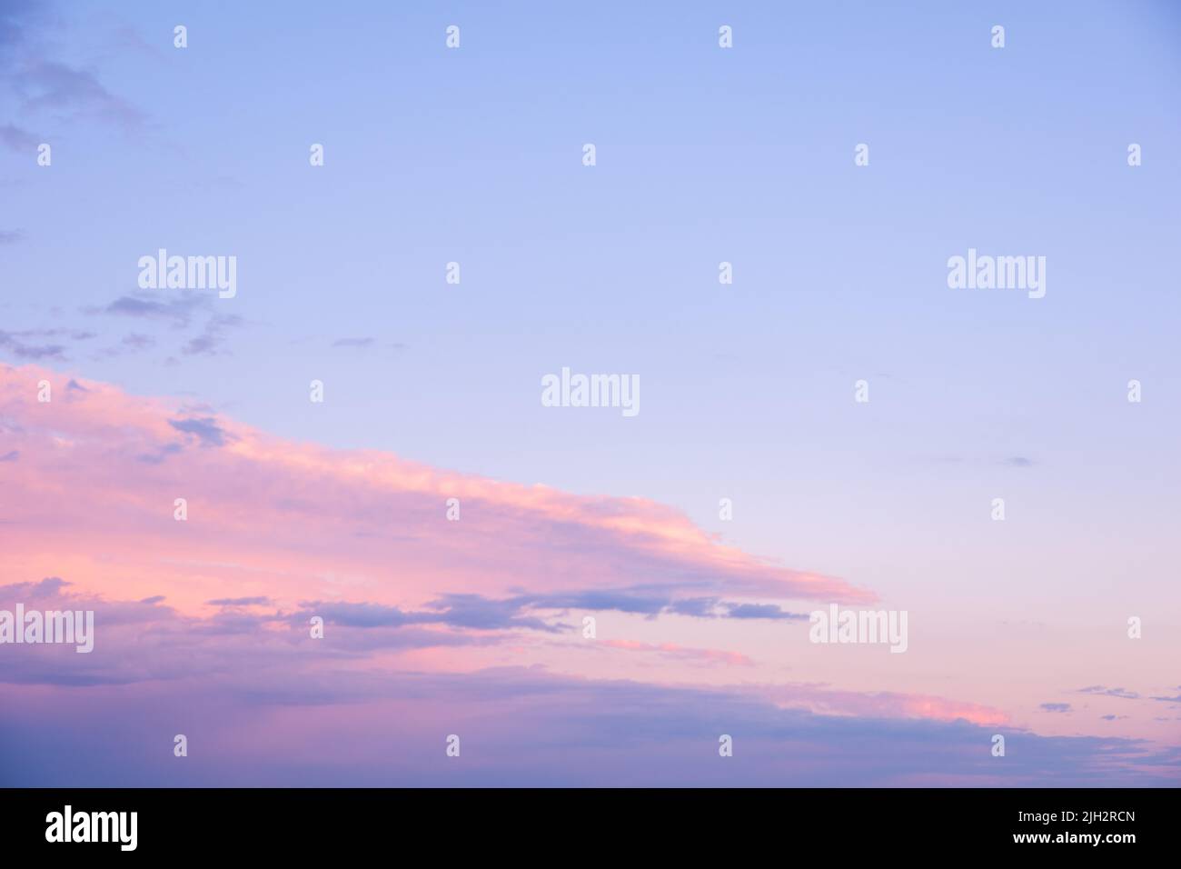 Abstract pink sunset sky background with motion blur. Bright pink-blue ...