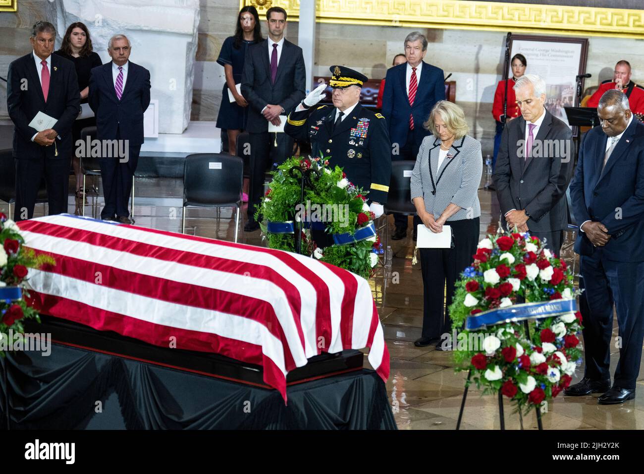 UNITED STATES - JULY 14: From left, Chairman of the Joint Chiefs of Staff Mark Milley, his wife Hollyanne, Veterans Affairs Secretary Denis McDonough, and Defense Secretary Lloyd Austin, pay respects to Hershel Woodrow “Woody” Williams, the last Medal of Honor recipient of World War II to pass away, in the U.S. Capitol Rotunda as his remains lie in honor in Washington, DC, on Thursday, July 14, 2022. Williams, who passed away at age 98, received the award for action in the Battle of Iwo Jima. (Photo by Tom Williams/Pool/Sipa USA) Stock Photo