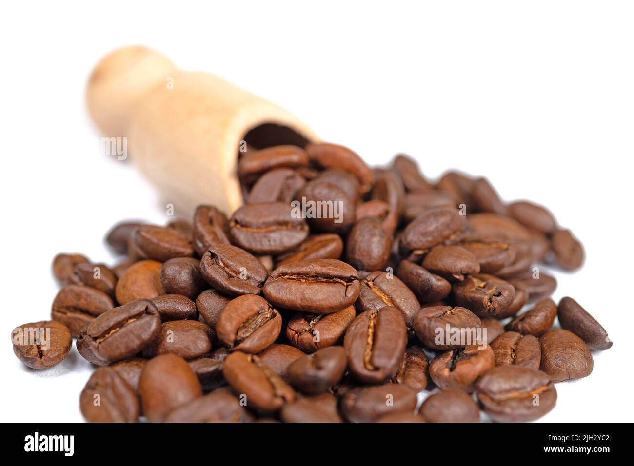 Roasted coffee beans against white background Stock Photo