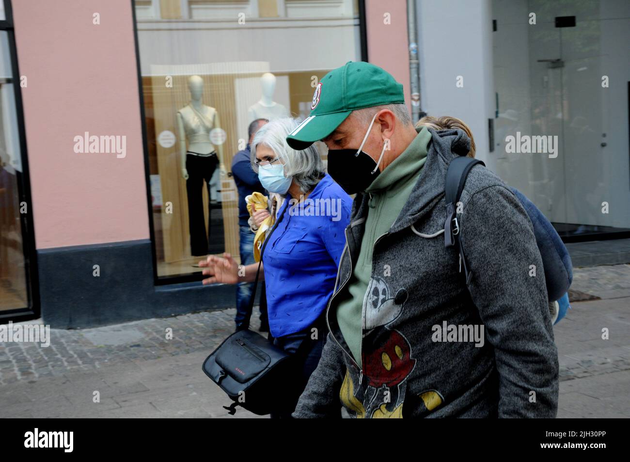Copenhagen /Denmark/14 July 2022/Tourists wear face mask during visiing